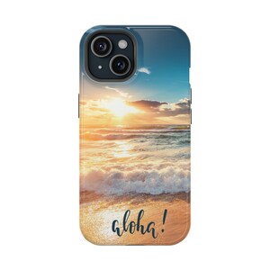 May include: A phone case with a sunset over the ocean and the word "Aloha!" on the bottom.