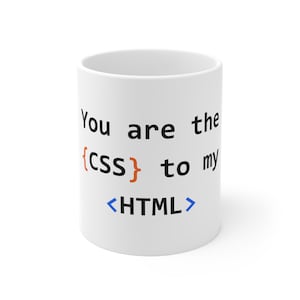 May include: White ceramic mug with the text "You are the {css} to my <HTML>" printed on it.