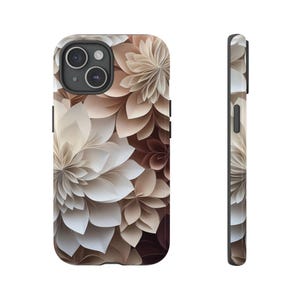 May include: A phone case with a floral design featuring white and brown paper flowers. The case has a black border and a cutout for the camera lens.