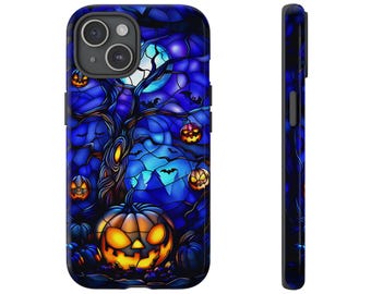 May include: A blue and black phone case with a stained glass design featuring a tree with pumpkins and bats. The pumpkins are orange and yellow with black faces. The background is a dark blue with a moon and stars.