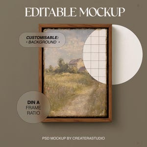 Könnte beinhalten: Gerahmter Leinwanddruck-Mockup mit einem Landschaftsgemälde. Das Kunstwerk zeigt eine ländliche Szene mit einem Haus, einem Weg und Feldern. Der Rahmen ist aus dunklem Holz. Text auf dem Bild lautet "EDITABLE MOCKUP", "CUSTOMISABLE: BACKGROUND", "DIN A FRAME RATIO" und "PSD MOCKUP BY CREATERASTUDIO".