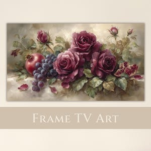 Peut inclure: Une œuvre d'art encadrée représentant une nature morte avec des roses rouge foncé, des raisins et une grenade. La peinture a un style doux et pictural avec un fond neutre. Le texte "FRAME TV ART" est en bas.