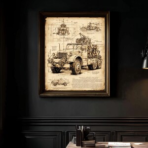 May include: Framed vintage blueprint art print depicting a detailed illustration of a military truck. The artwork is in sepia tones, showcasing the truck's design with diagrams and technical drawings. The print is displayed in a dark wooden frame.