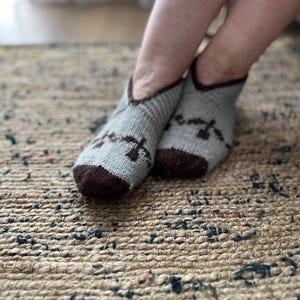 Hand knitted gray socks slippers