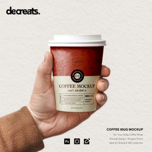 May include: A coffee mug mockup held in a hand. The mug is red with a white lid and features the text "COFFEE MOCKUP 100% ARABICA". The design includes coffee bean illustrations and a label with additional details. The mug is designed for a daily coffee ritual.