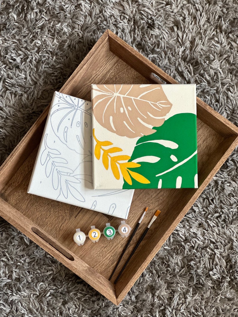 May include: A set of three ceramic mugs with a speckled, matte finish. The mugs are in shades of cream, light brown, and dark brown. Each mug has a simple, minimalist design, perfect for coffee or tea.