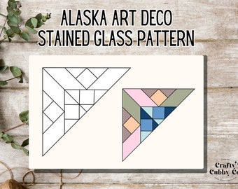 May include: A design featuring two triangular patterns, one in black and white and the other in pastel colors. The text "ALASKA ART DECO STAINED GLASS PATTERN" is at the top. The Crafty Cubby Co. logo is in the bottom right corner.