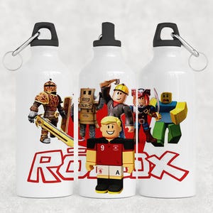 May include: Three white water bottles with a vibrant Roblox character graphic and the Roblox logo in red. Each bottle has a black cap and a silver carabiner clip. These bottles are designed for hydration and are suitable for various activities.