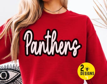 May include: A red sweatshirt with the word "Panthers" in a white, cursive font with a black outline. A small yellow circle with the text "2 Designs" is in the lower right corner.