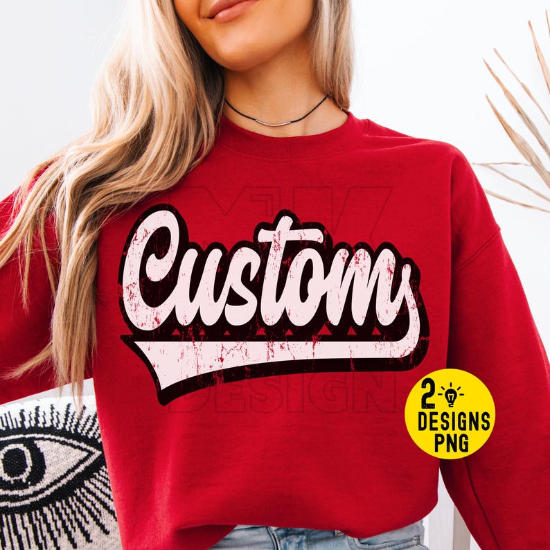 May include: A red sweatshirt with the word "Custom" in a distressed, white, retro font. The text is outlined in black and has a pink shadow. A small yellow circle with "2 Designs PNG" is in the lower right corner.