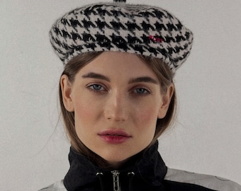 Wool beret in black and white houndstooth, pink accent detail, cozy stylish accessory for fall