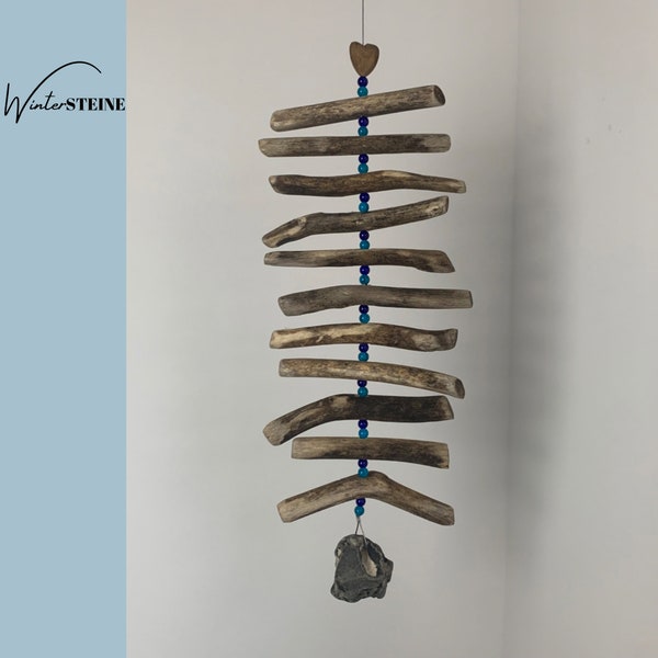 Wind chime made of driftwood with blue/turquoise glass beads and stone