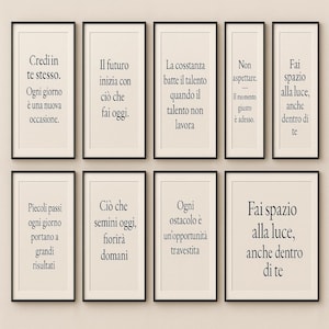 May include: Eight black framed prints with inspirational quotes in Italian. The quotes are printed on a cream background. The quotes are: "Credi in te stesso. Ogni giorno è una nuova occasione.", "Il futuro inizia con ciò che fai oggi.", "La costanza batte il talento quando il talento non lavora.", "Non aspettare. Il momento giusto è adesso.", "Fai spazio alla luce, anche dentro di te.", "Piccoli passi ogni giorno portano a grandi risultati.", "Ciò che semini oggi, fiorirà domani.", "Ogni ostacolo è un'opportunità travestita."