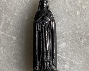 A tiny little pocket Saint Therese