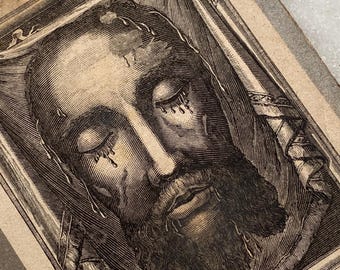 A vintage French prayer card of the Sacred Face of our Lord Jesus Christ
