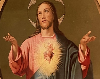 A vintage French framed Sacred Heart picture