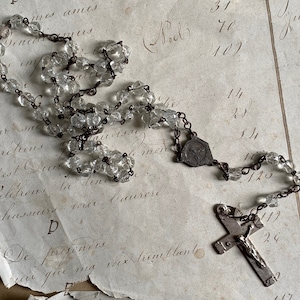 A vintage French clear glass rosary, rosary beads