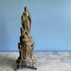 A vintage French statue of Our Lady of Lourdes and St Bernadette