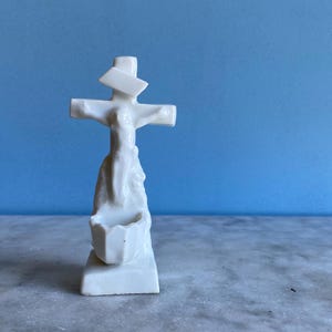 A vintage French white porcelain holy water font