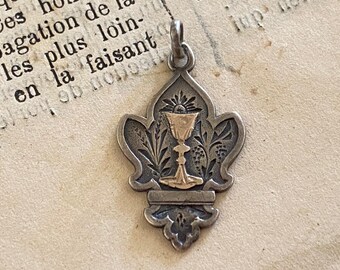 An antique French silver Eucharist medal, First Holy Communion souvenir