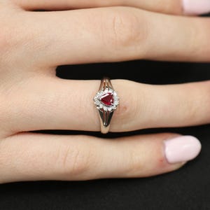 May include: A set of three ceramic mugs with a speckled, matte finish. The mugs are in shades of cream, light gray, and dark gray. Each mug has a simple, minimalist design, perfect for coffee or tea.