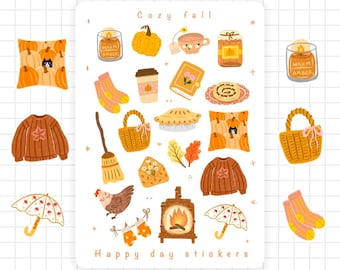 May include: A sticker sheet with a cozy fall theme. The sheet features illustrations of pumpkins, candles, sweaters, a pie, a basket, and other autumn-themed items. The text "Cozy Fall" and "Happy day stickers" are also included.