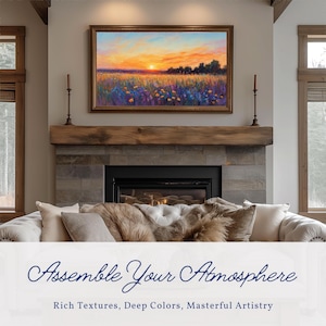 Puede incluir: Una pintura de paisaje enmarcada representa una puesta de sol sobre un campo de flores silvestres. La obra de arte se exhibe sobre una chimenea con una repisa de madera. La habitación cuenta con un sofá capitoné y velas decorativas. El texto en la parte inferior dice "Assemble Your Atmosphere."