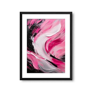 May include: Abstract art print in a black frame. The artwork features a dynamic composition of pink, white, gray, and black brushstrokes. The textured paint creates a sense of movement and depth, with a focus on flowing, curved shapes.