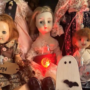 Flo the Haunted Doll.