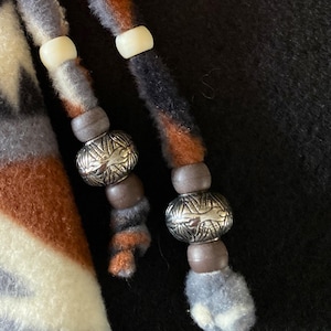 Note the beadwork on this drawstring  tie!  Customer can have input on beads, making their skirt unique and personal.