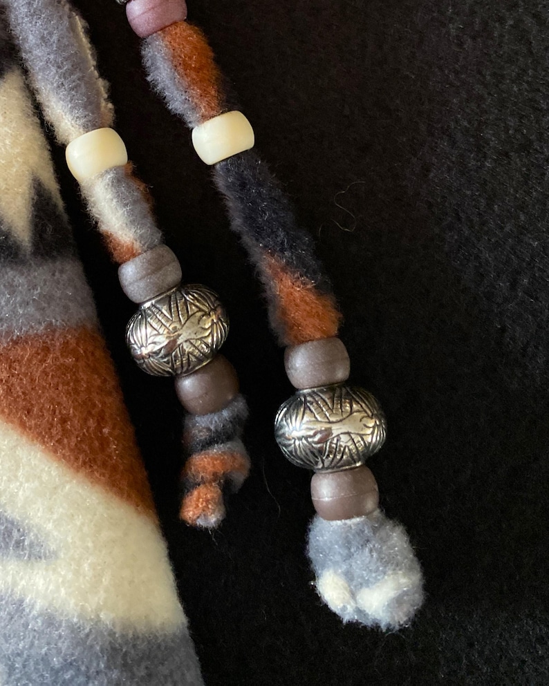 Note the beadwork on this drawstring  tie!  Customer can have input on beads, making their skirt unique and personal.