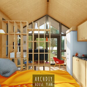 Interior perspective looking past the bedroom and wooden room divider toward the large glass front doors and a kitchen area.