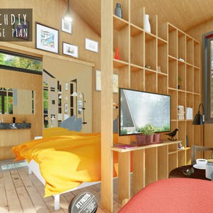 Interior view of the tiny house bedroom and living space featuring wood-paneled walls, an orange bedspread, and an open shelving room divider.