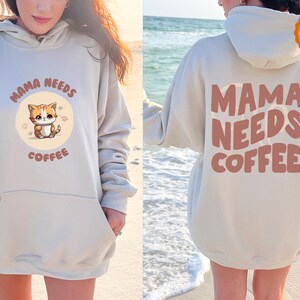 Coffee Cat Hoodie - Funny Cat Sweatshirt for Cat Moms, Trendy Cat Lover Gift, Cozy Cat Sweater, Gift for Her - Mama Needs Coffee Shirt