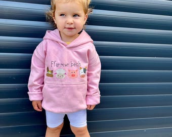 Baby Pink Welsh Children's Hoodie, 'Ffarmwr Bech' or 'Ffarmwr bach' Slogan