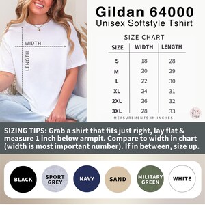 May include: White Gildan 64000 Unisex Softstyle T-shirt. The image includes a size chart with measurements in inches, ranging from S (18" width, 28" length) to 3XL (28" width, 33" length). Color options include black, sport grey, navy, sand, military green, and white.
