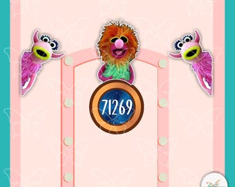 May include: A light pink door graphic featuring a central circular plaque with the number 71269 in white text. A fuzzy, multi-colored creature with orange hair sits above the plaque, flanked by two pink, horned creatures on the sides.