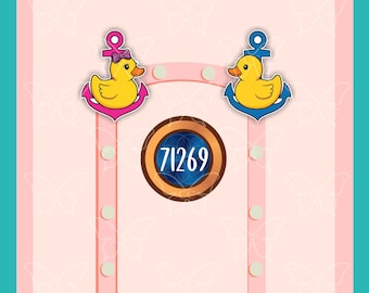 May include: Two yellow rubber ducks, one with a purple bow, each positioned on a colorful anchor. Below them is a circular bronze-toned frame containing the white text 71269, set against a light pink background with a repeating butterfly pattern.