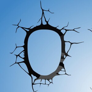 May include: A black silhouette of a cracked wall with a circular hole in the center against a blue sky background.