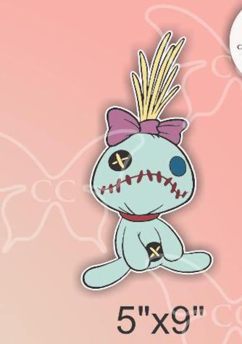 May include: A light blue cartoon doll sticker with a purple bow, yellow hair, and red stitching. The sticker is 5" x 9" in size. The doll has a black cross for an eye and a blue eye on the other side.