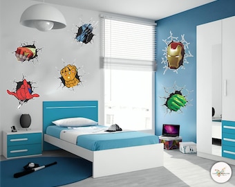May include: A bedroom featuring superhero-themed wall decals. The decals depict various superhero elements, including a fist, a gauntlet, and a mask, all emerging from cracked wall effects. The room also includes a bed, nightstand, and a blue rug.
