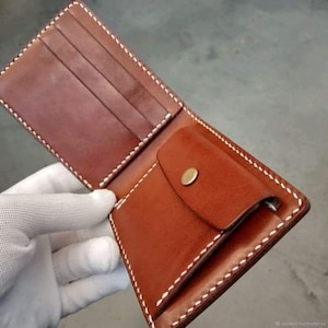 Cartera de cuero 100% hecha a mano.