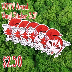 May include: A stack of 3.5-inch vinyl stickers featuring a red-haired anime-style character with a white and black design. The stickers have the text "Shimp" and "enthusiast". The text "VOTV Ariral Vinyl Sticker" is at the top.