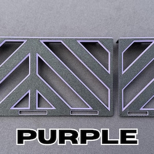May include: Two dark gray metal decorative pieces with a geometric design and purple accents. The word "PURPLE" is displayed in large, bold, white letters with a black outline at the bottom of the image.