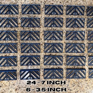 May include: A collection of dark blue rectangular objects with a geometric chevron design. The objects vary in size, with the largest measuring 7 inches in length and the smallest 3.5 inches. Text at the bottom reads "24-7 INCH" and "6-3.5 INCH".