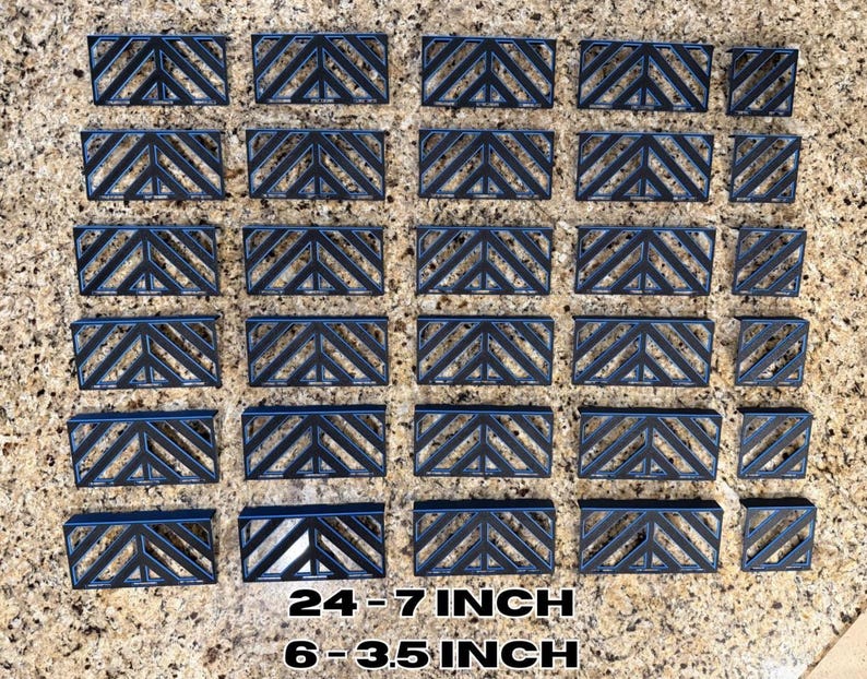 May include: A collection of dark blue rectangular objects with a geometric chevron design. The objects vary in size, with the largest measuring 7 inches in length and the smallest 3.5 inches. Text at the bottom reads "24-7 INCH" and "6-3.5 INCH".