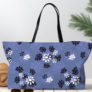 Blue Weekender Bag Travel Duffel Floral Pattern Daisy Design Navy Flower Periwinkle Color Vacation Luggage Overnight Carryall Cotton Handle Fabric Satchel Women Getaway Beach Tote Stylish Travel Accessory Fashion Forward Design Spacious