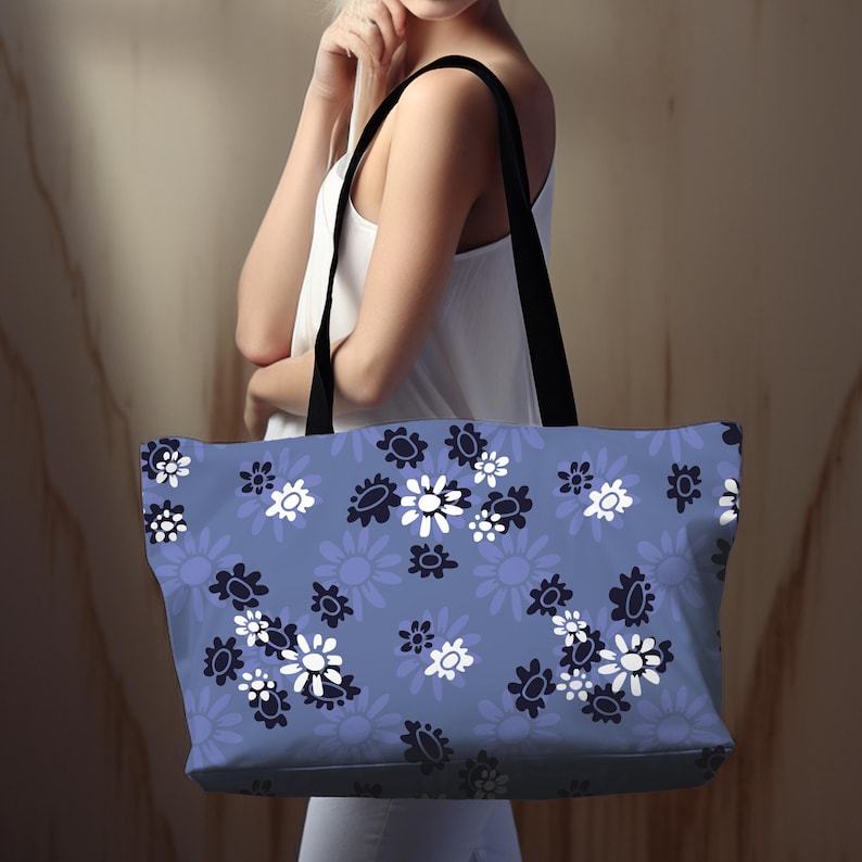 Blue Weekender Bag Travel Duffel Floral Pattern Daisy Design Navy Flower Periwinkle Color Vacation Luggage Overnight Carryall Cotton Handle Fabric Satchel Women Getaway Beach Tote Stylish Travel Accessory Fashion Forward Design Spacious