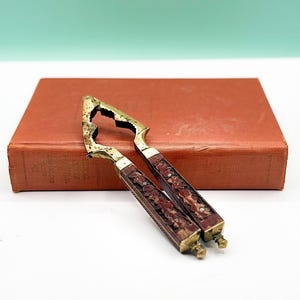 Vintage Brass and Wood Nut Cracker or Crab Leg Cracker with Intricate Floral Carvings