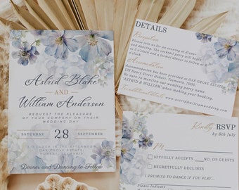May include: A wedding invitation suite with a watercolor floral design in shades of blue. The invitation features the couple's names, "Astrid Blake and William Anderson", the date "Saturday, September 28", and the location "Oak Grove Estate, Hobart, Tasmania". The RSVP card includes a section for guests to indicate their meal choice: "Meat", "Fish", or "Vegetarian".